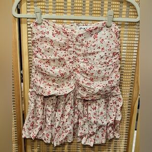 Ganni Red Floral Mini Skirt with Upper Ruching and Flowy Bottom.